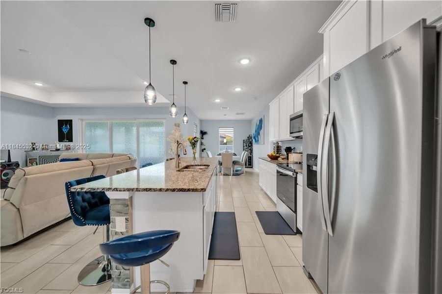 Furnished interior view inside a new home in , Cape Coral (Image 4). Furnished interior view inside a new home in , Cape Coral (Image 4).