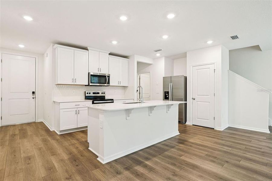 Furnished interior view inside a new home in Bradford Park, Ormond Beach (Image 6).