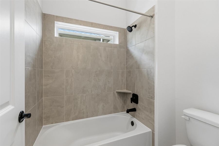 Furnished interior view inside a new home in Aldeana, Bonney (Image 8).