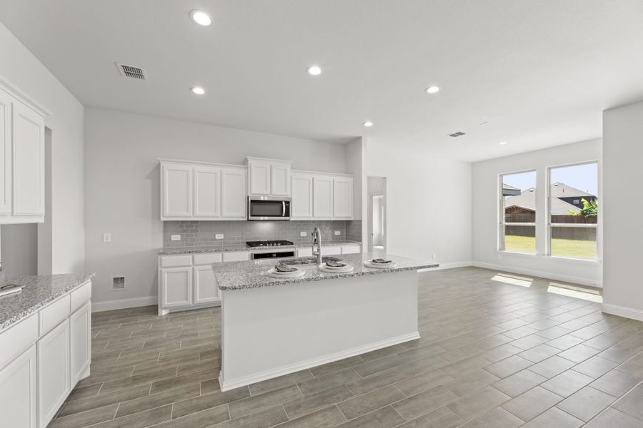 Representative exterior photo of a completed home built from the Hampton by Impression Homes in Timberbrook, Justin, TX (Image 6). Representative exterior photo of a completed home built from the Hampton by Impression Homes in Timberbrook, Justin, TX (Image 6).