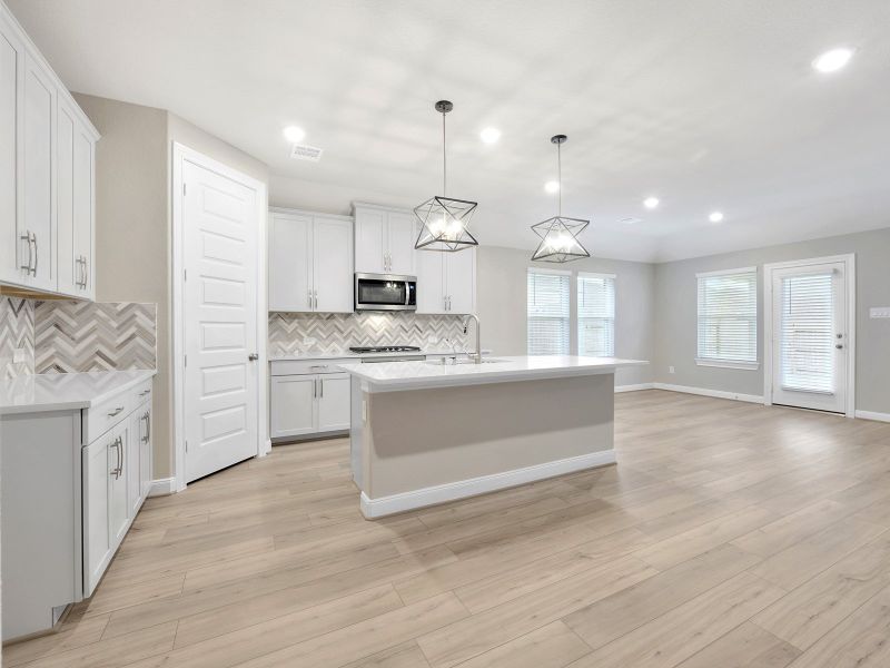 Furnished interior view inside a new home in Pine Lake Cove - Classic Series, Montgomery (Image 6).