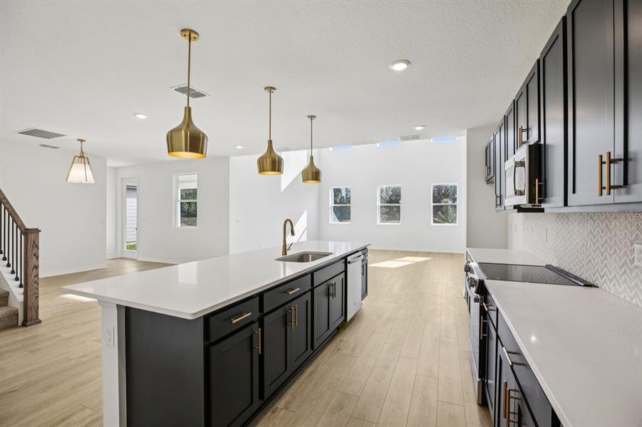 Furnished interior view inside a new home in Northlake at Ovation, Winter Garden (Image 10).