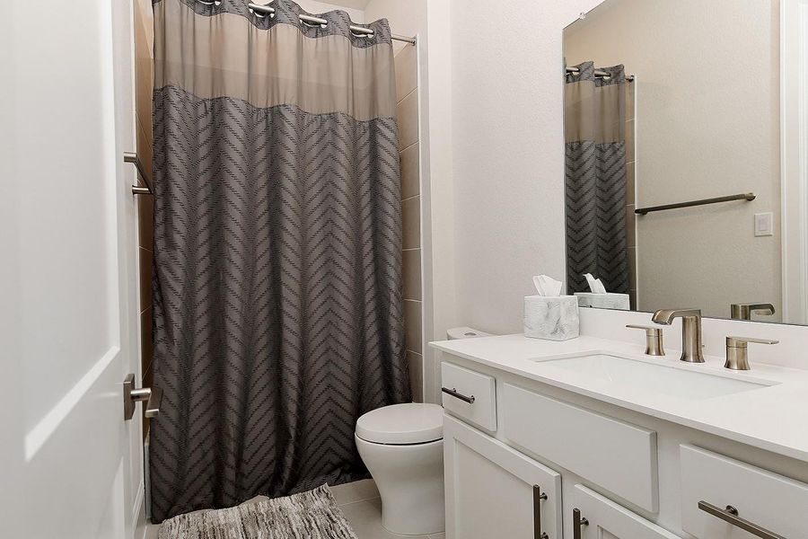 Furnished interior view inside a new home in The Highlands - 65', Porter (Image 13). Furnished interior view inside a new home in The Highlands - 65', Porter (Image 13).