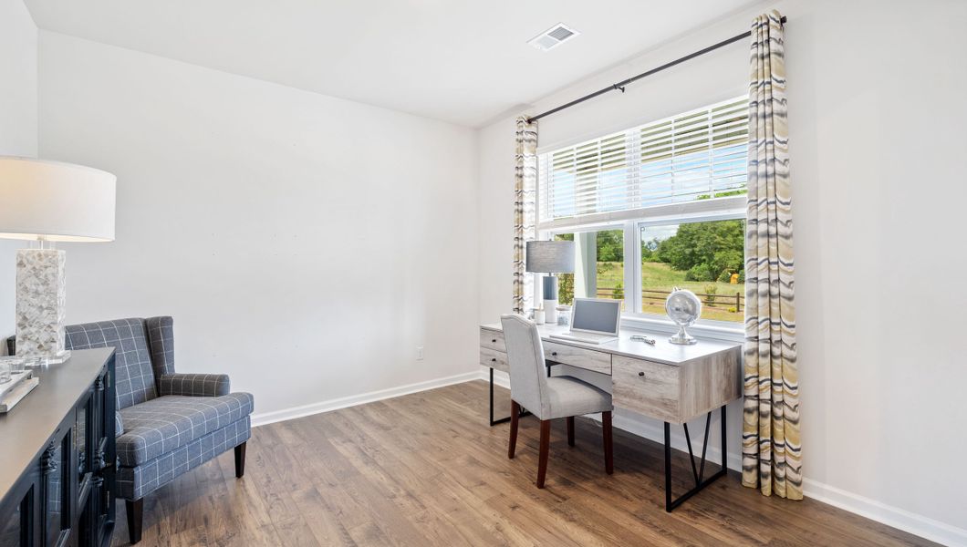 Representative furnished interior of a home built from the Hayden by D.R. Horton in Brookside Farms, Greer (Image 8).
