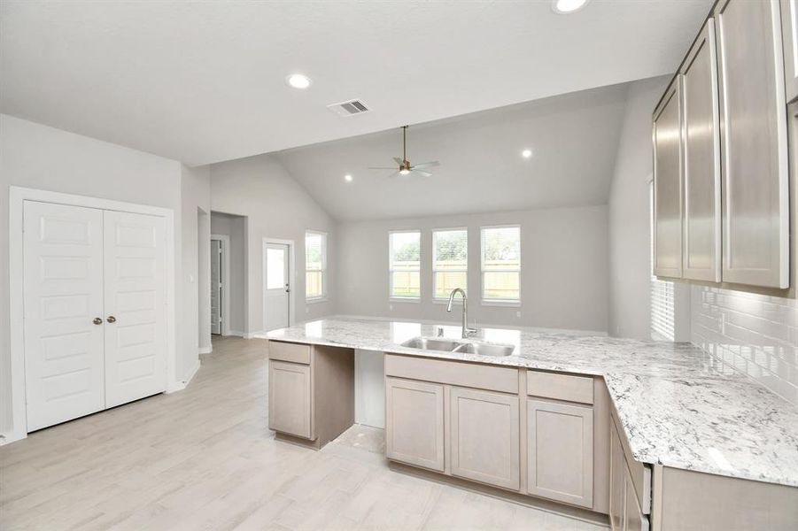 Step into the dream kitchen you've always wanted! Example photo of completed home with similar plan. Actual may vary.