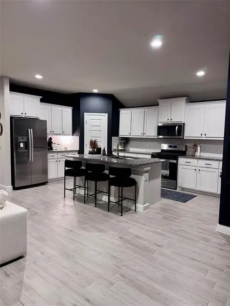 Furnished interior view inside a new home in , Cleburne (Image 4).