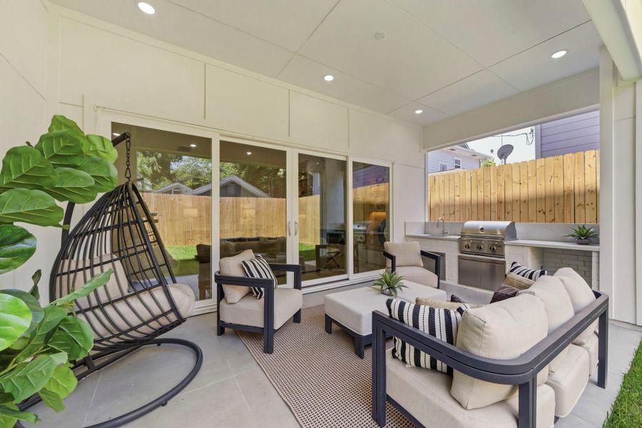 This photo showcases a finished backyard patio, a key feature of a completed Niche Homes construction. This photo showcases a finished backyard patio, a key feature of a completed Niche Homes construction.