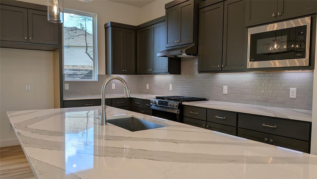 Furnished interior view inside a new home in Artavia, Conroe (Image 9).