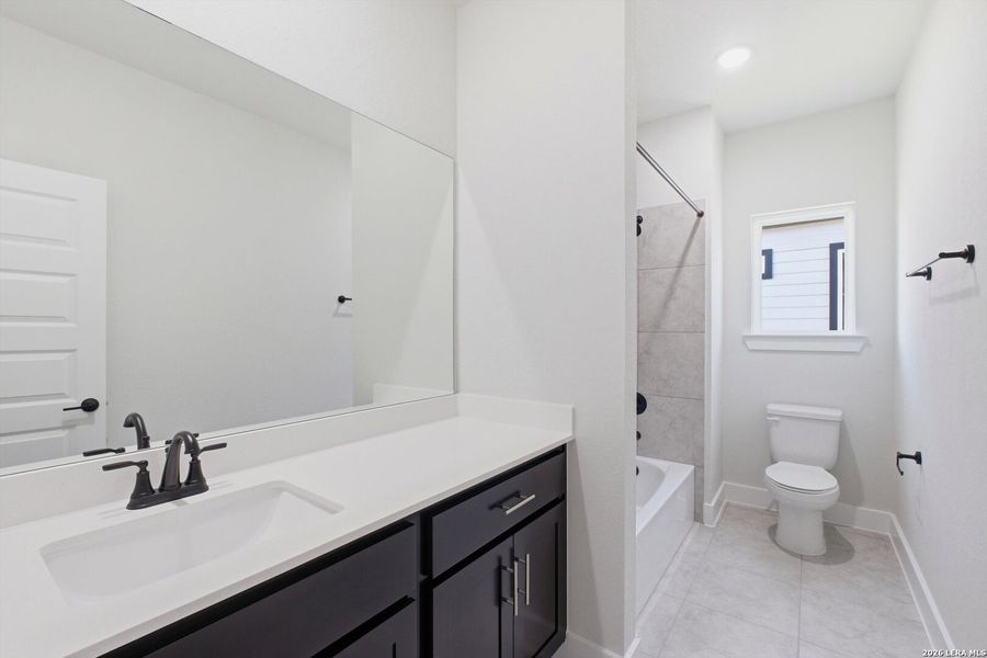 Furnished interior view inside a new home in Crown Ridge Manor, San Antonio (Image 7).