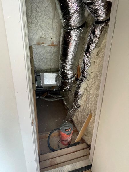 Spray-foam insulated utility closet housing ductwork and HVAC components for energy efficiency. There are several attic closets and entry points throughout the upstairs living space. Spray-foam insulated utility closet housing ductwork and HVAC components for energy efficiency. There are several attic closets and entry points throughout the upstairs living space.