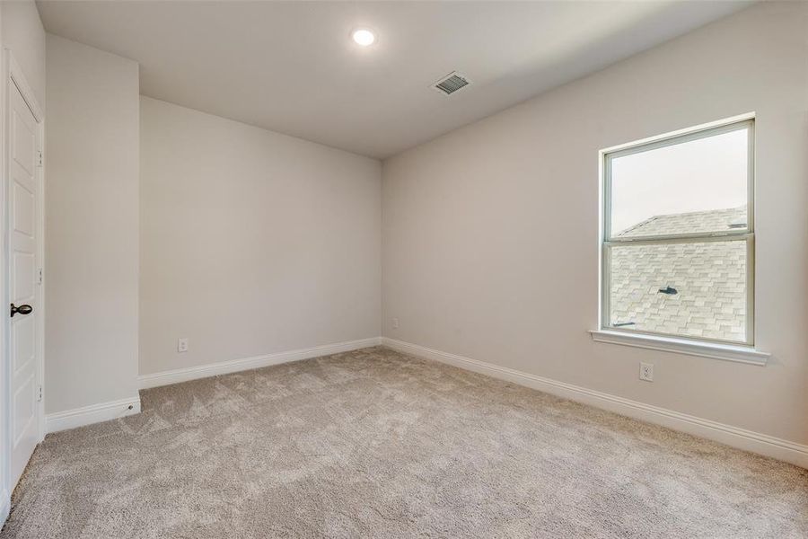 Spacious, unfurnished interior of a new home in Spiritas Ranch, Little Elm (Image 24).