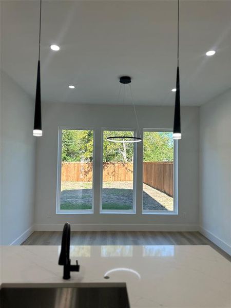 Interior details featuring wood-type flooring and sink