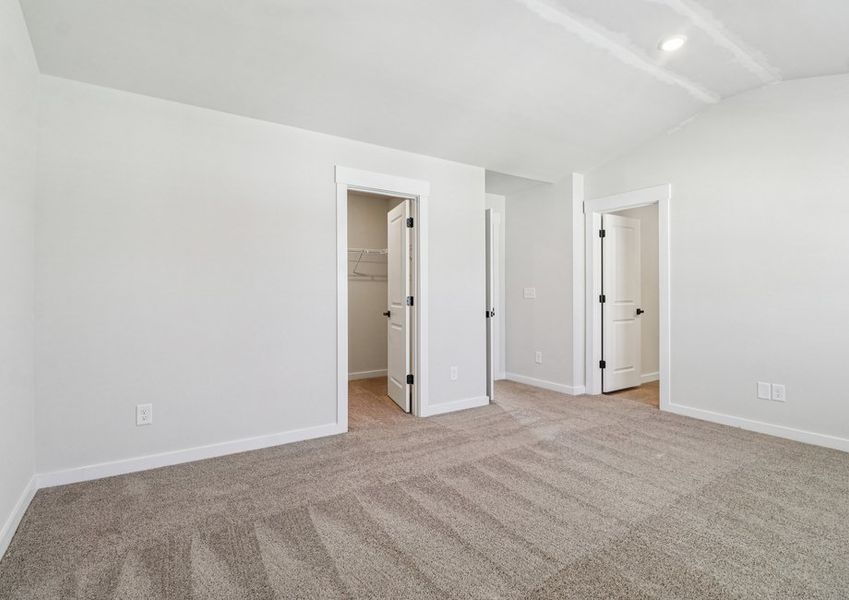 The master suite has a bathroom attached.