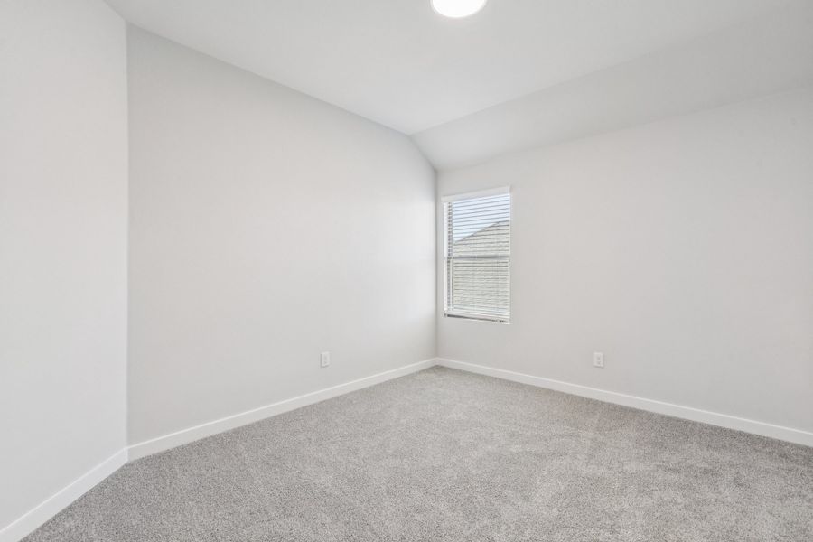 Bedroom in the Winters home plan by Trophy Signature Homes – REPRESENTATIVE PHOTO Bedroom in the Winters home plan by Trophy Signature Homes – REPRESENTATIVE PHOTO