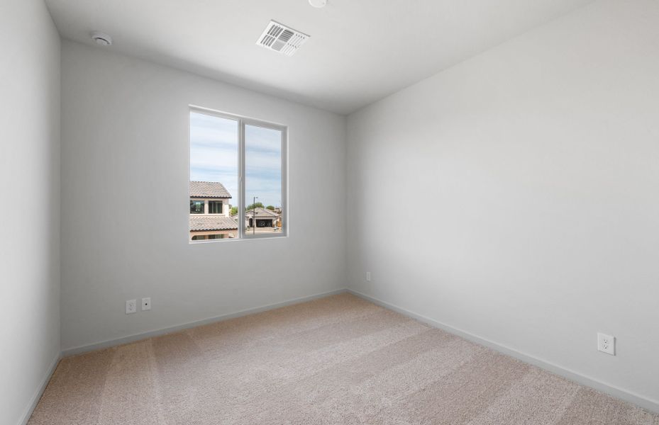 Spacious, unfurnished interior of a new home in Legado West, Queen Creek (Image 24).