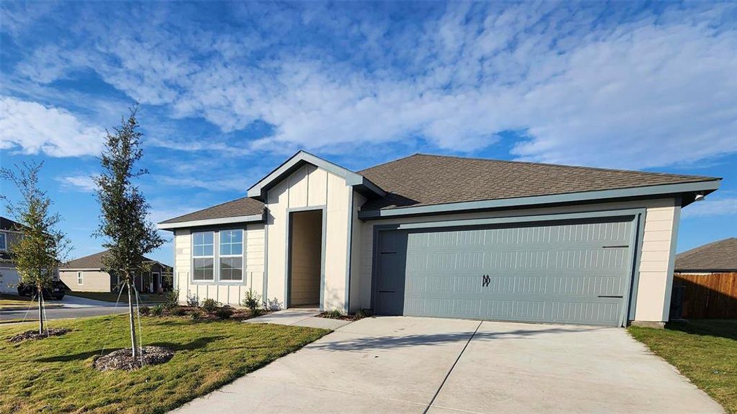 Front exterior of a new home in Waverly Estates, Josephine, TX, highlighting curb appeal (Image 2).