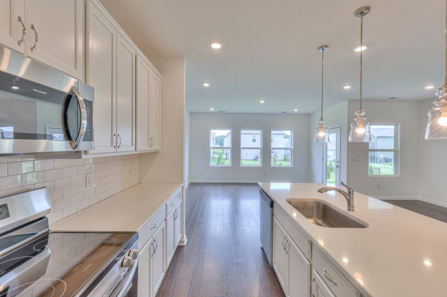 *Photo of example home. Selections & Finishes May Vary.