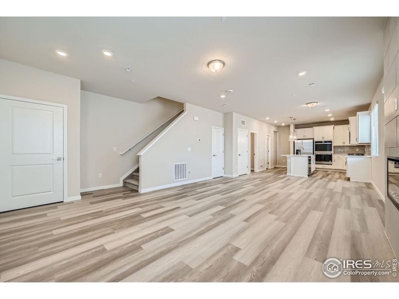 GRAND OPEN FLOOR PLAN WITH GREAT ROOM, DINING AND KITCHEN!