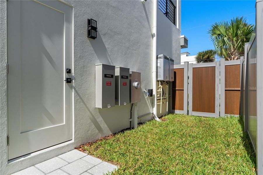 Exterior details and patio area of a home in , New Smyrna Beach (Image 77).