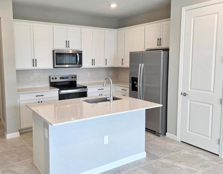 Furnished interior view inside a new home in Everton, Lantana (Image 5).