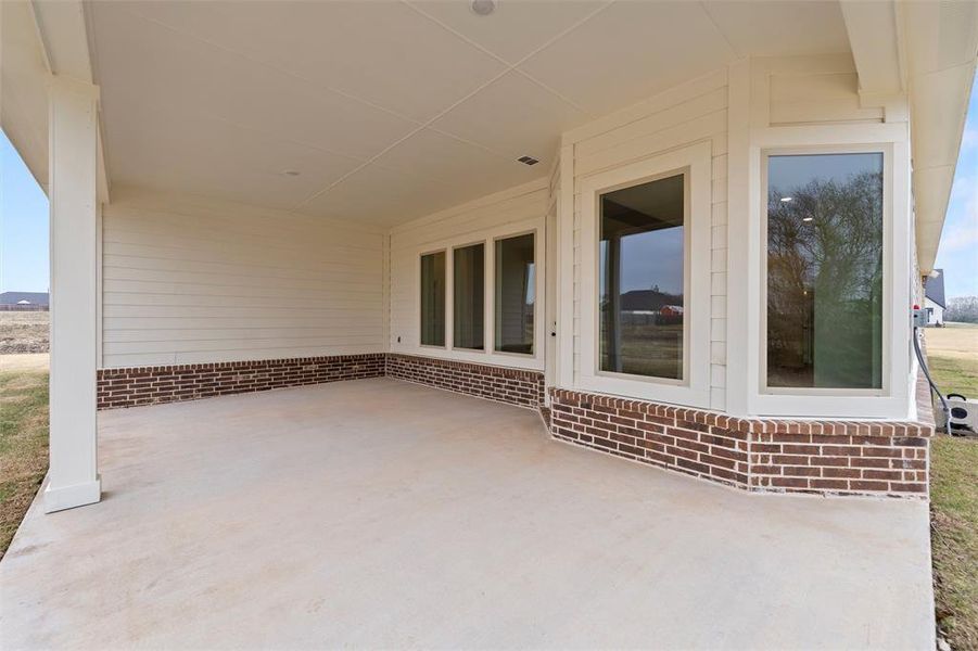 Exterior details and patio area of a home in Nash Estates, Tom Bean (Image 28). Exterior details and patio area of a home in Nash Estates, Tom Bean (Image 28).