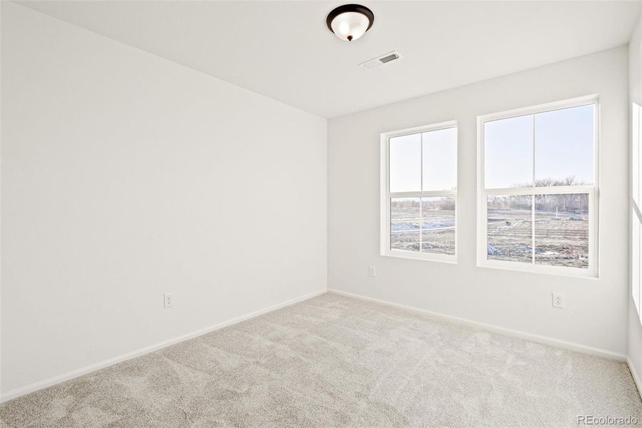 Spacious, unfurnished interior of a new home in The Nest Classic at Canyon Creek, Erie (Image 30).