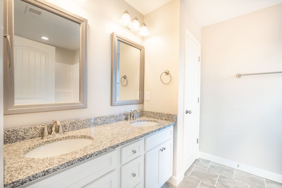 Representative furnished interior of a home built from the Sage by Enchanted Homes in Lonesome Dove, San Antonio (Image 13).