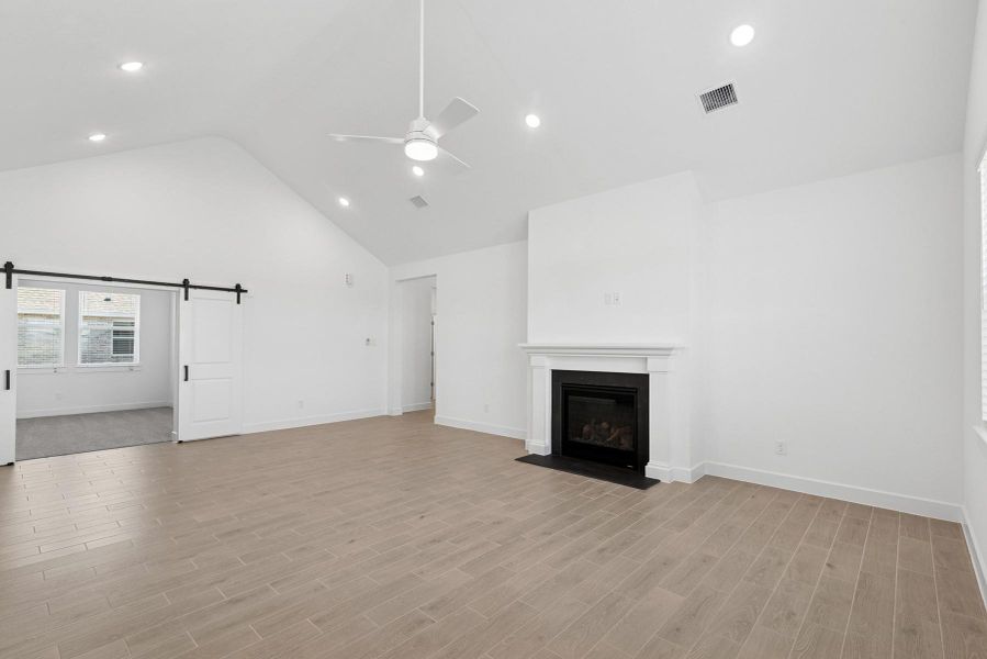 Relaxing great room with cozy fireplace (*Photo not of actual home and used for illustration purposes only.)