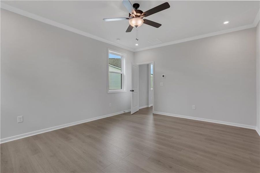 Spacious, unfurnished interior of a new home in The Paddocks at Doc Hughes, Buford (Image 48).