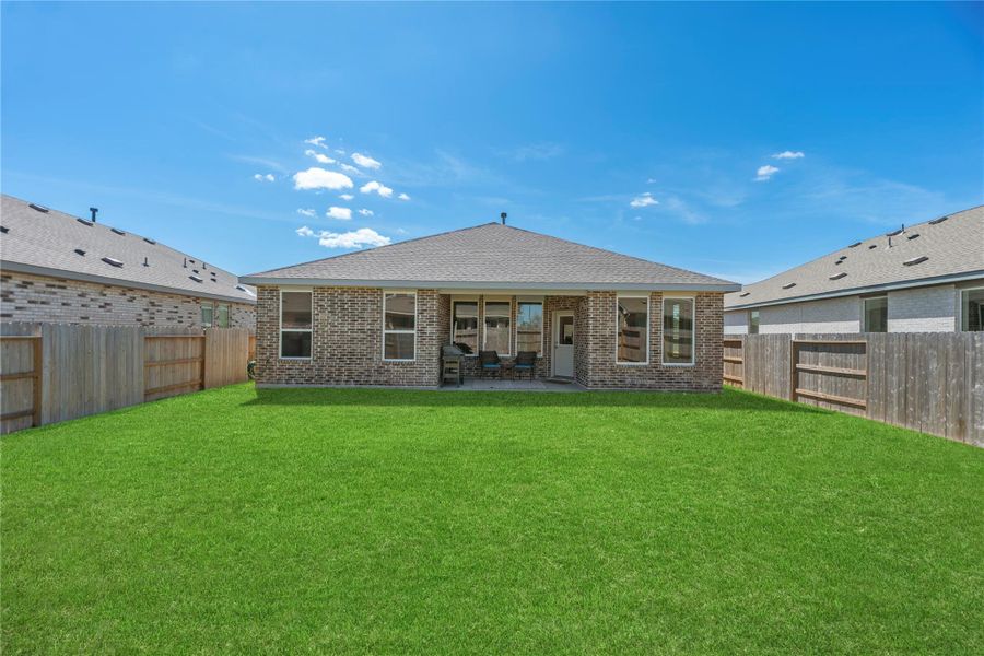Fully fenced backyard with room to create your ideal outdoor space.