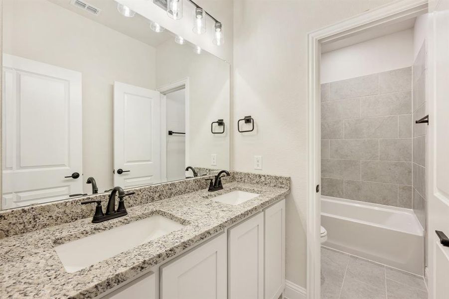 Furnished interior view inside a new home in Coyote Crossing, Godley (Image 11).