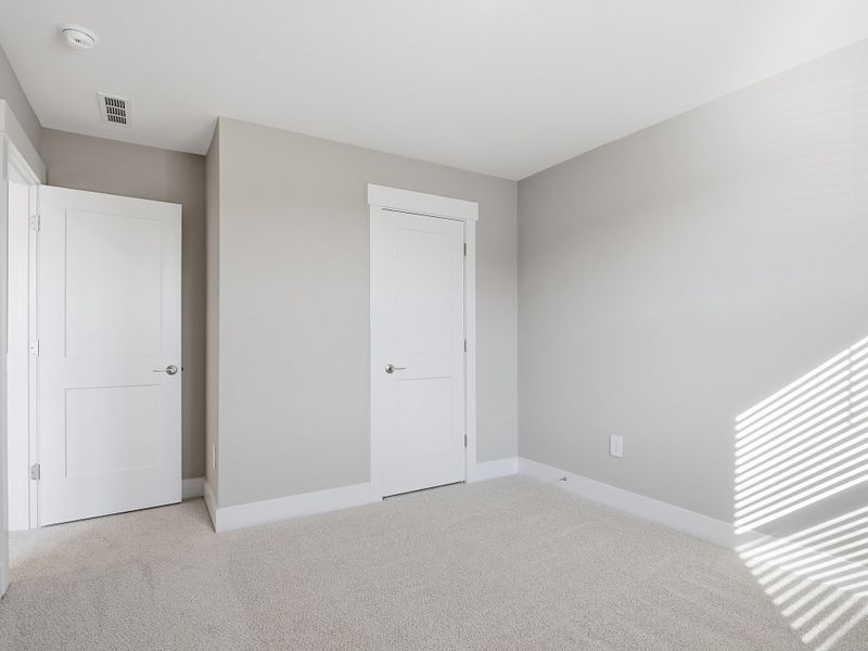 Spacious, unfurnished interior of a new home in Watkins Glen, Raleigh (Image 21).