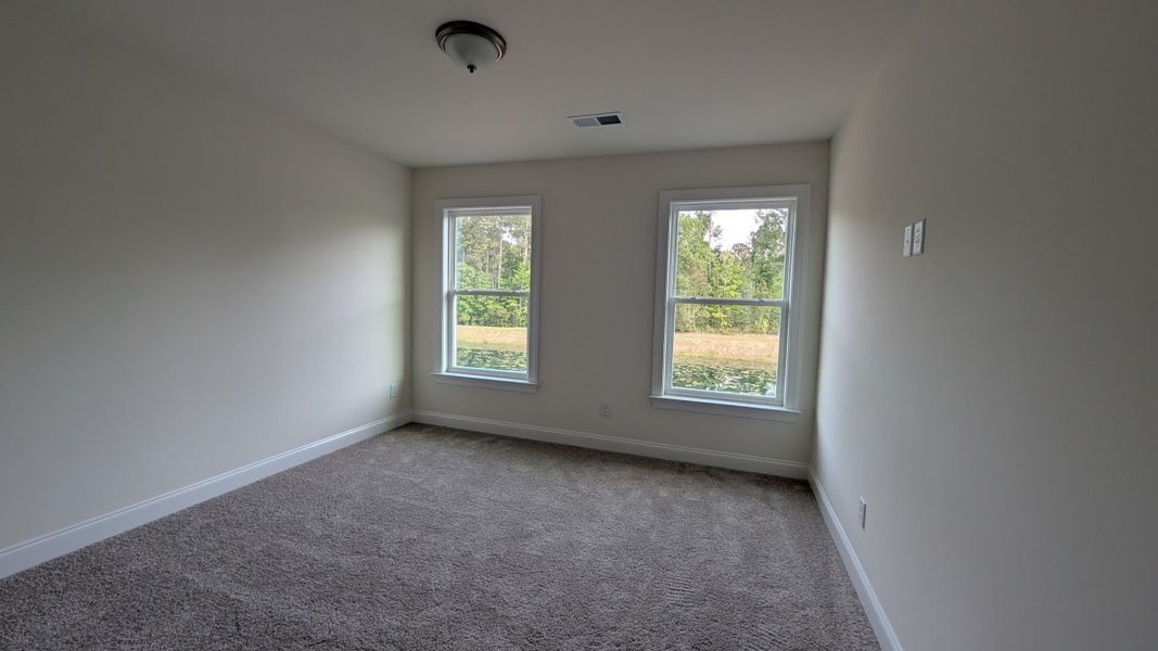 Spacious, unfurnished interior of a new home in Parker's Preserve, Ridgeville (Image 34).