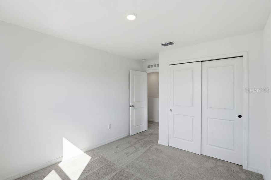 Spacious, unfurnished interior of a new home in Waterstone, Groveland (Image 21).