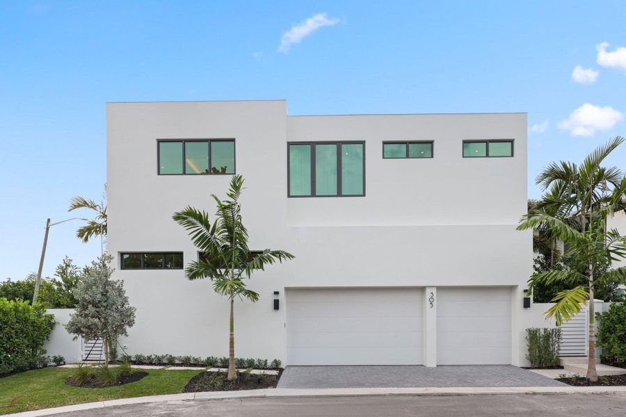 Front exterior of a new home in , Delray Beach, FL, highlighting curb appeal (Image 24).