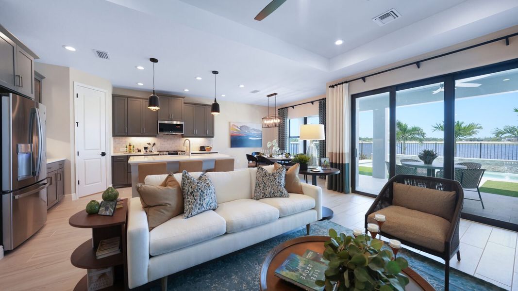 Representative furnished interior of a home built from the Meadow Brook by Neal Communities in SkySail, Naples (Image 7).