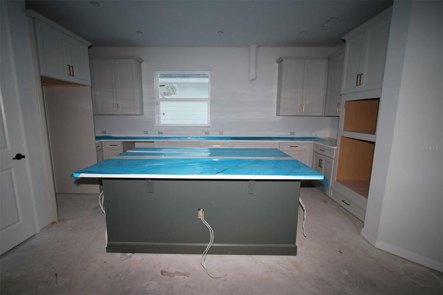 In-progress construction of a new home in Weslyn Park in Sunbridge 34', St. Cloud, FL (Image 4).