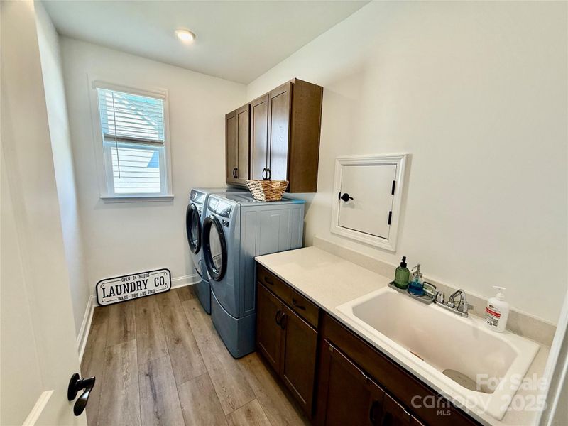 Laundry Room with pass through door to Primary Bedroom Closet