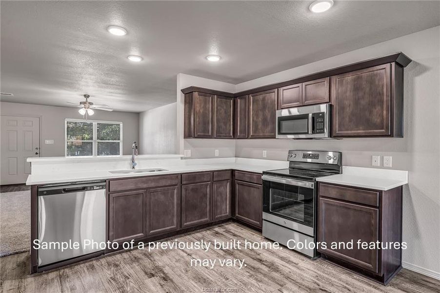 **Photos are sample photos of similar plan. Colors and features might vary**