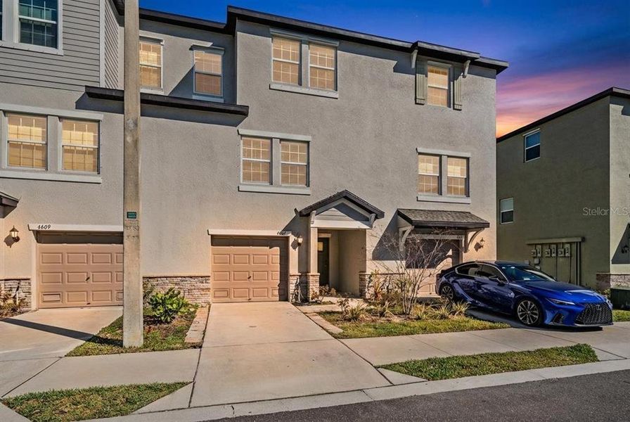 Front exterior of a new home in , Tampa, FL, highlighting curb appeal (Image 27).