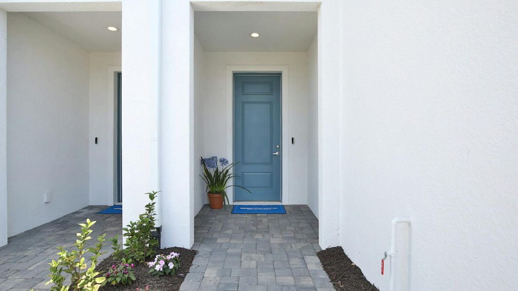 Exterior details and patio area of a home in Palm Grove Real Estate and Homes for Sale in Lakewood Ranch, FL - Neal Communities, Lakewood Ranch (Image 24).