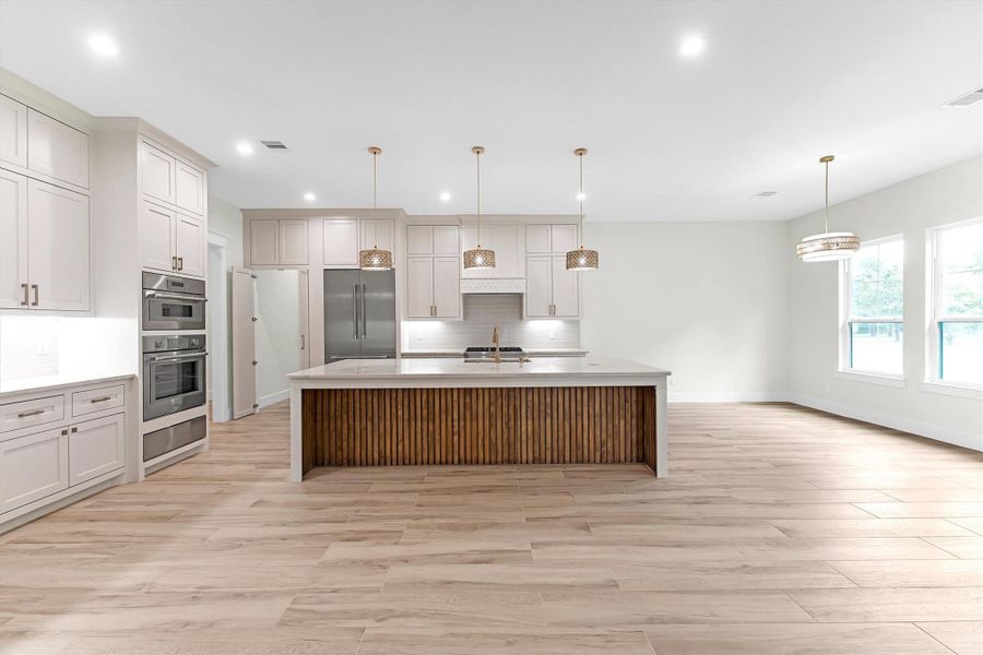 Furnished interior view inside a new home in , Conroe (Image 12).