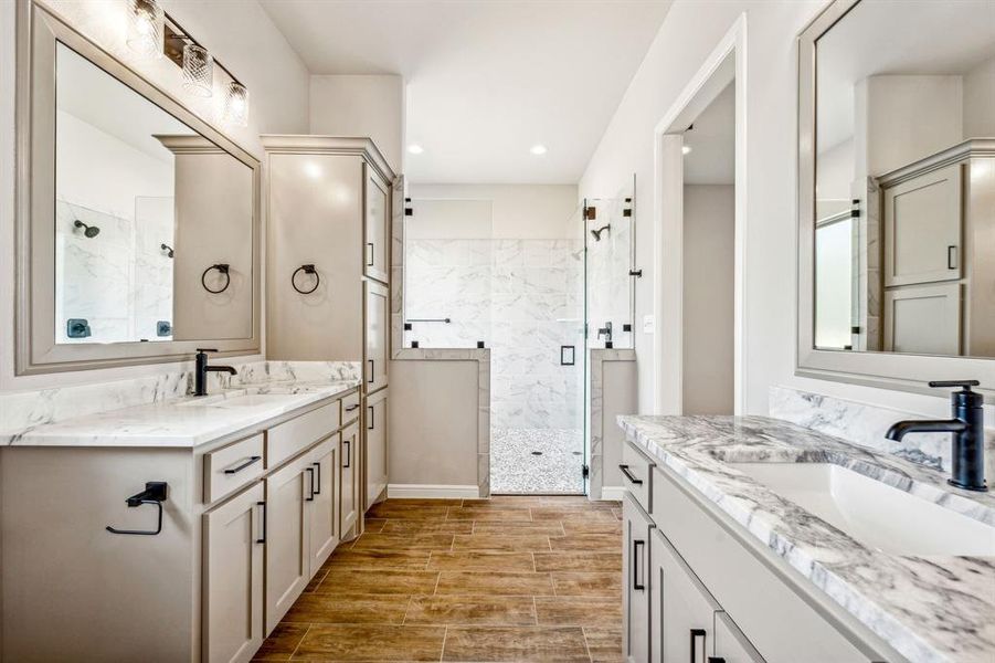 Bathroom with vanity and an enclosed shower