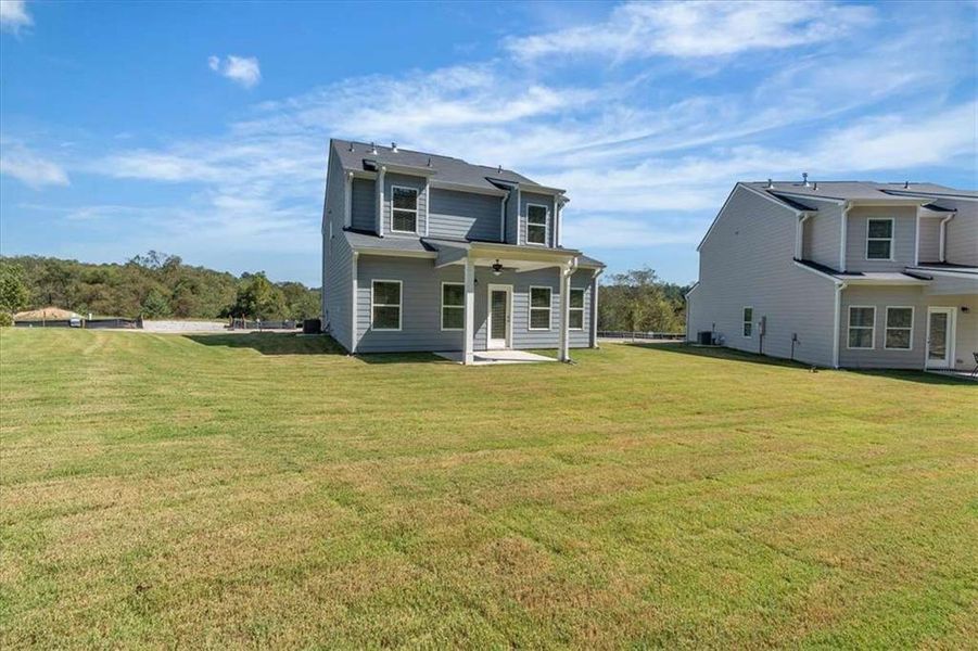 Exterior details and patio area of a home in The View at Groover's Lake, Lithia Springs (Image 24). Exterior details and patio area of a home in The View at Groover's Lake, Lithia Springs (Image 24).