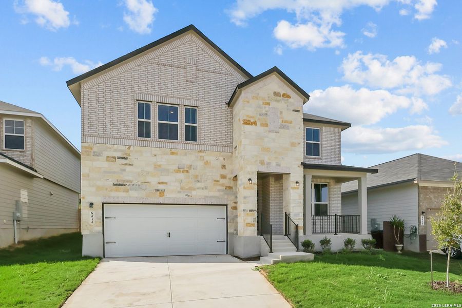 Front exterior of a new home in Royal Crest, San Antonio, TX, highlighting curb appeal (Image 28).