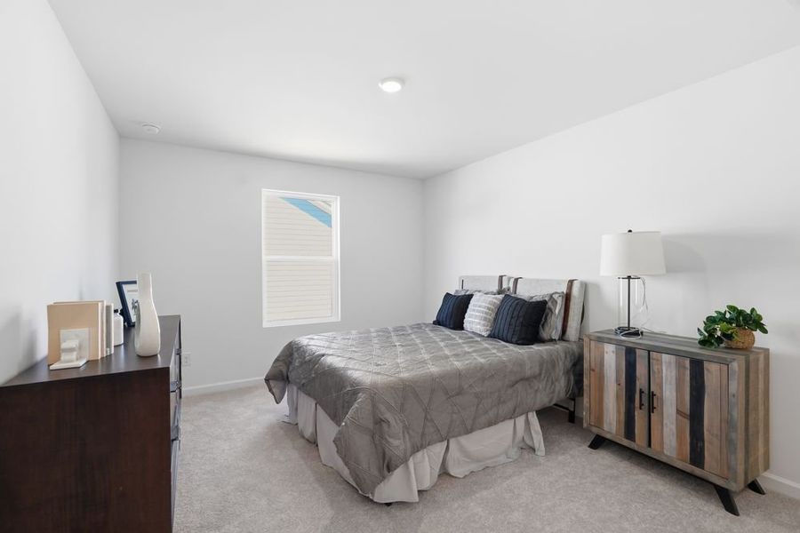 Representative furnished interior of a home built from the Norcross by Taylor Morrison in Windance Lake, Loganville (Image 34).