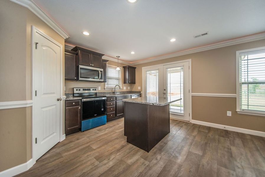 Representative furnished interior of a home built from the Reynolds by Enchanted Homes in Arcadia Village, Spartanburg (Image 11).
