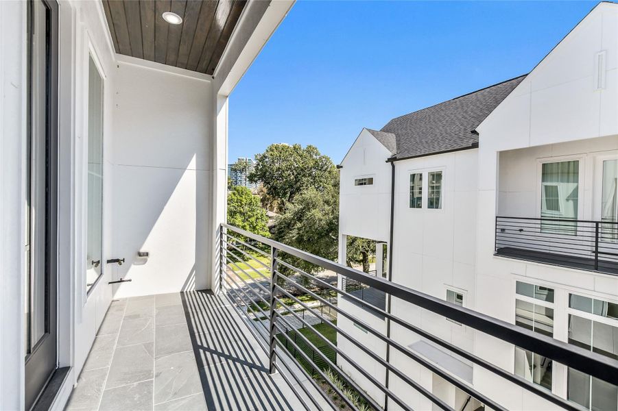 Step onto your private balcony finished in slate tile and sleek metal railings, offering fresh air and scenic views. Perfectly positioned for quiet reflection or a morning reset, this covered space embodies the builder’s vision of luxury living with low-maintenance materials and modern design continuity from interior to exterior. Step onto your private balcony finished in slate tile and sleek metal railings, offering fresh air and scenic views. Perfectly positioned for quiet reflection or a morning reset, this covered space embodies the builder’s vision of luxury living with low-maintenance materials and modern design continuity from interior to exterior.