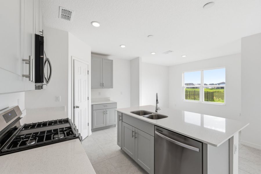 Furnished interior view inside a new home in Highfield at Twisted Oaks, Wildwood (Image 4).