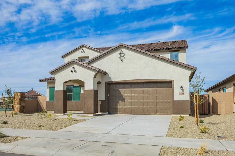 Front exterior of a new home in Frontera, Surprise, AZ, highlighting curb appeal (Image 1). Front exterior of a new home in Frontera, Surprise, AZ, highlighting curb appeal (Image 1).